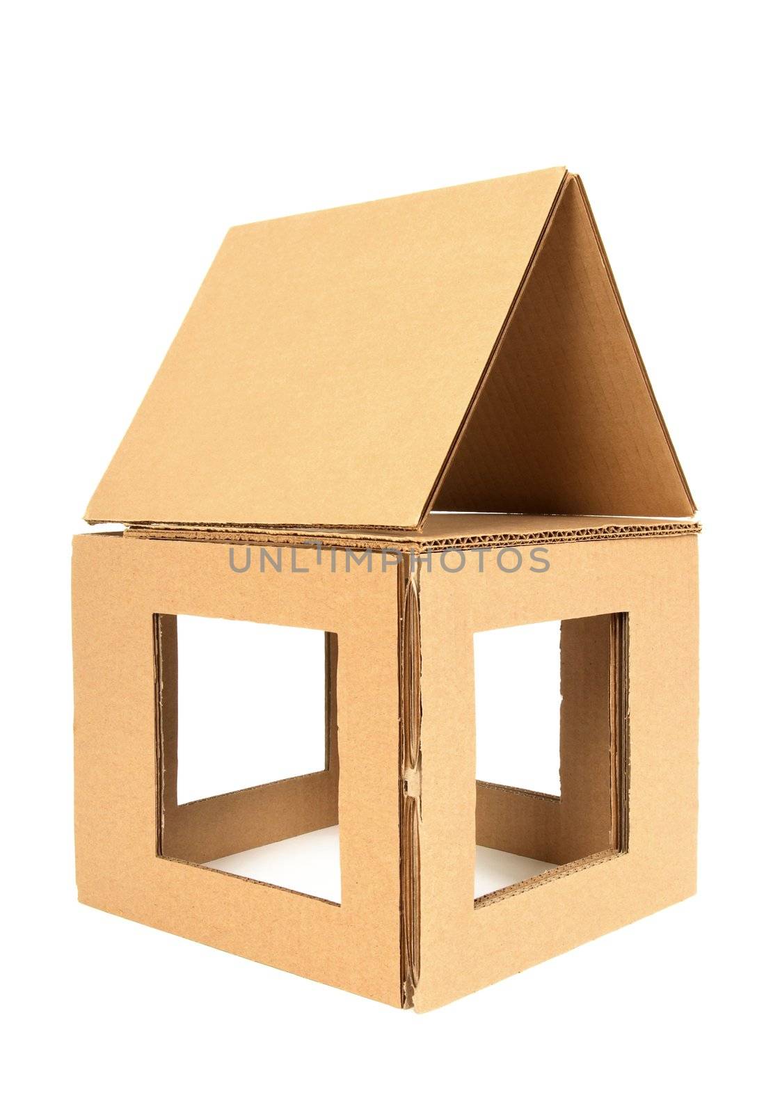 House made of used cardboard, on white background.