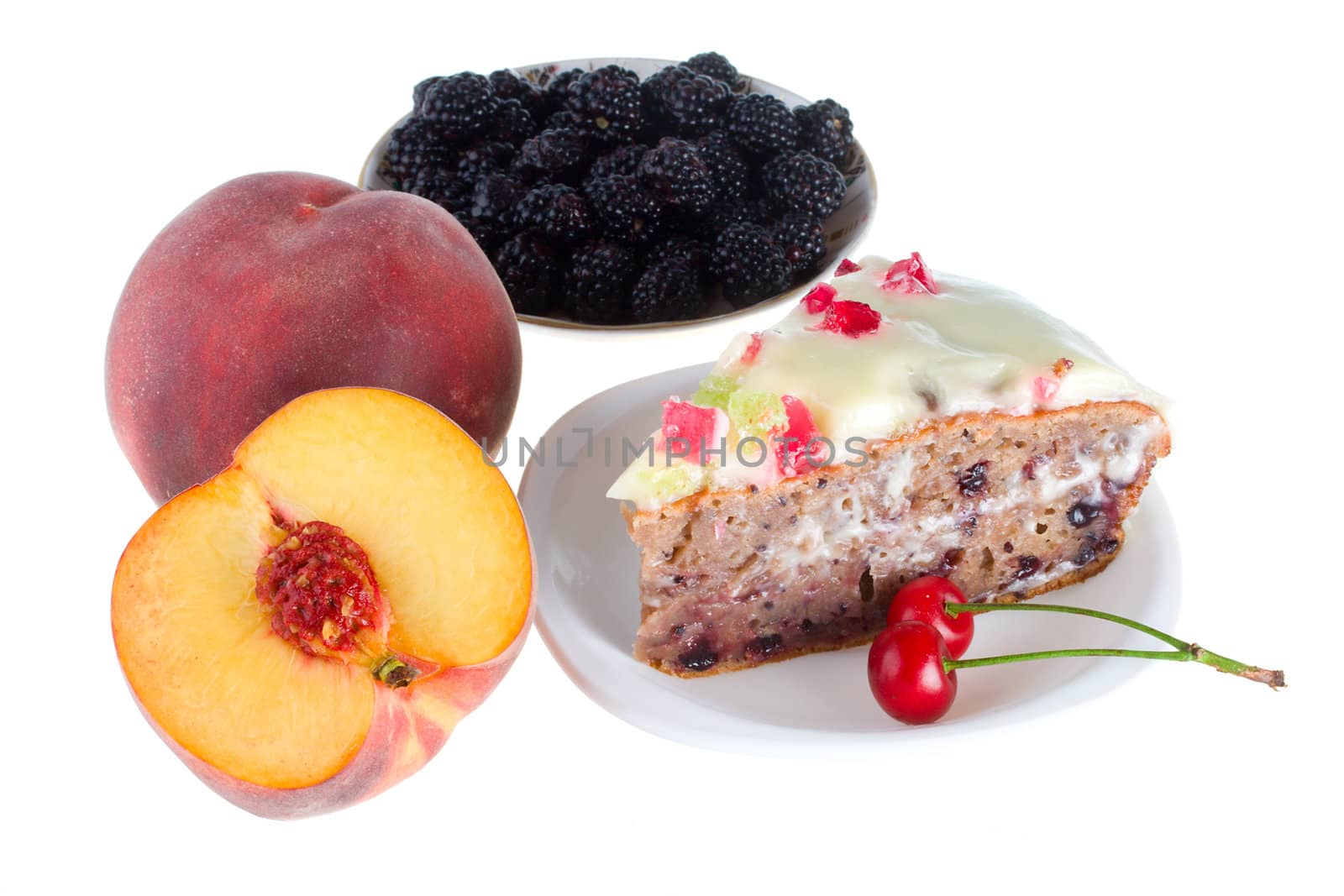 various fruits and cake, isolated on white