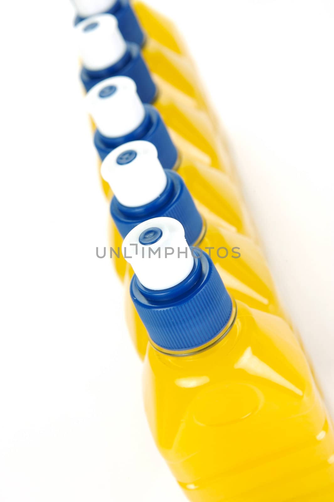 Pop top juice bottles isolated against a white background