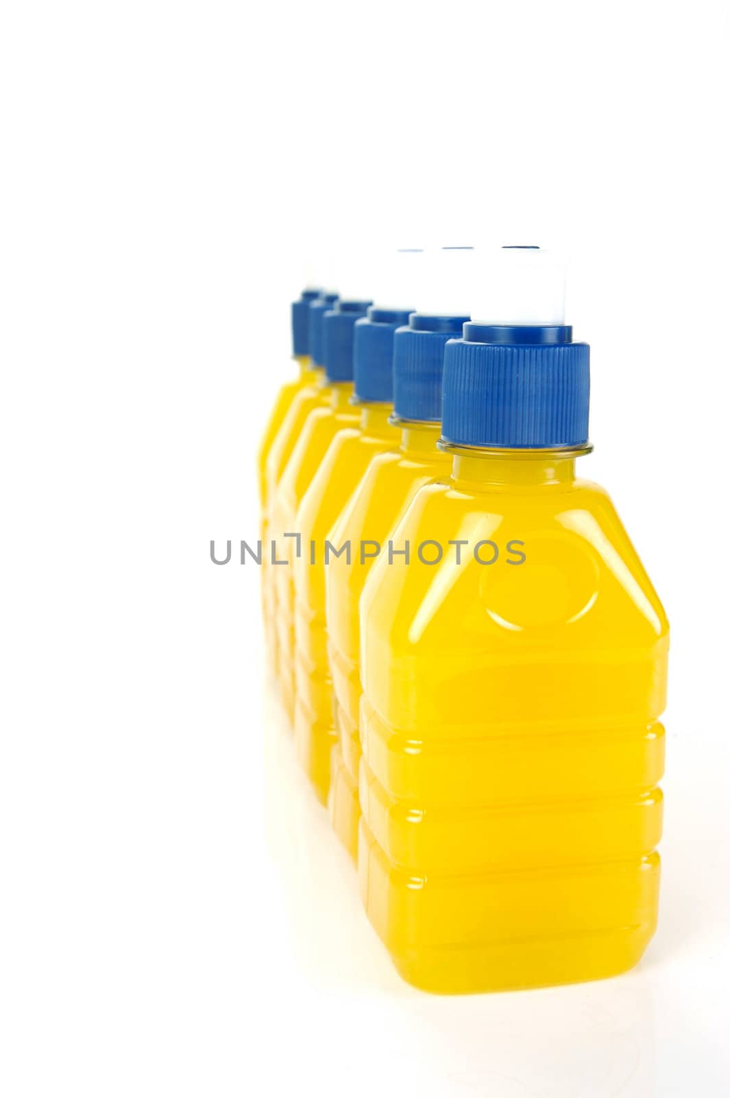Pop top juice bottles isolated against a white background