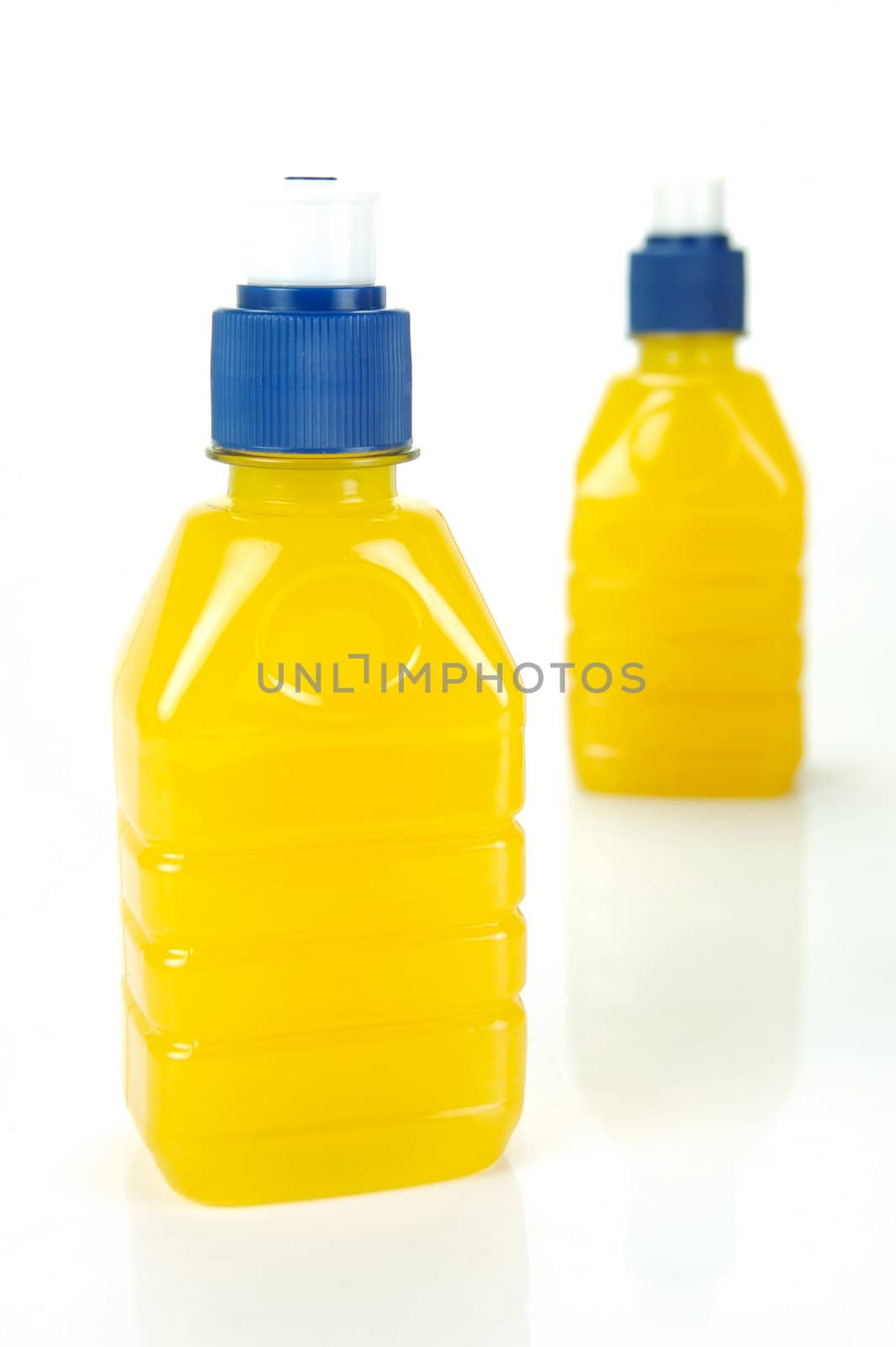 Pop top juice bottles isolated against a white background