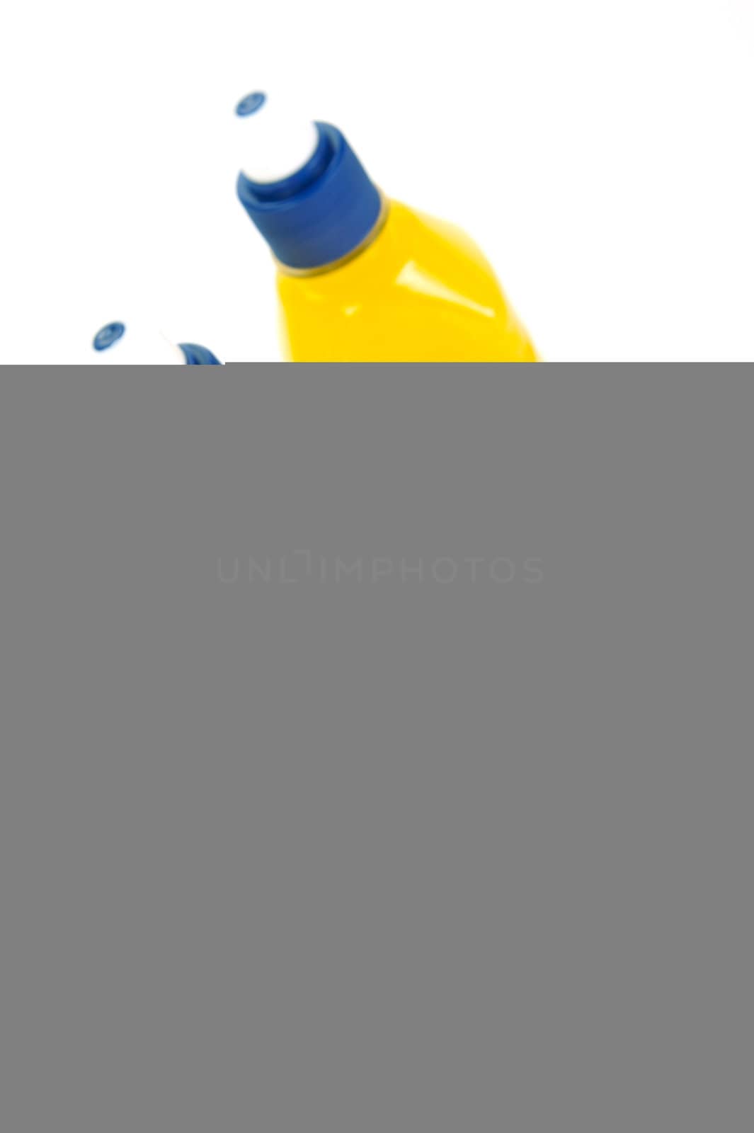 Pop top juice bottles isolated against a white background