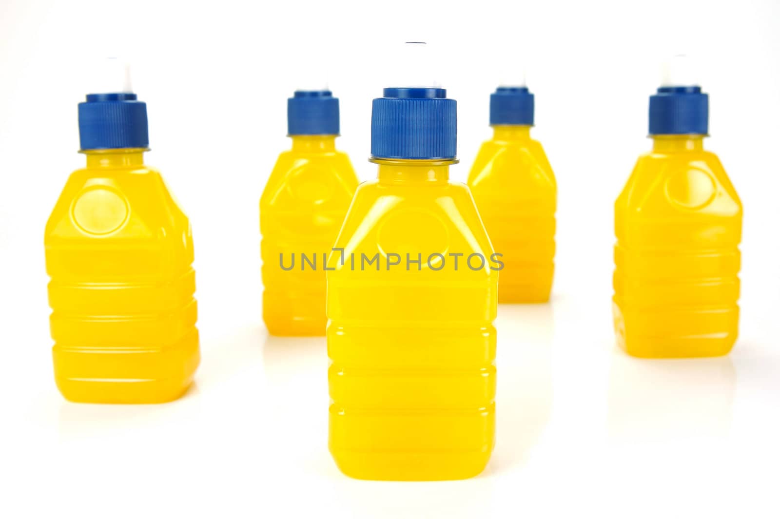 Pop top juice bottles isolated against a white background