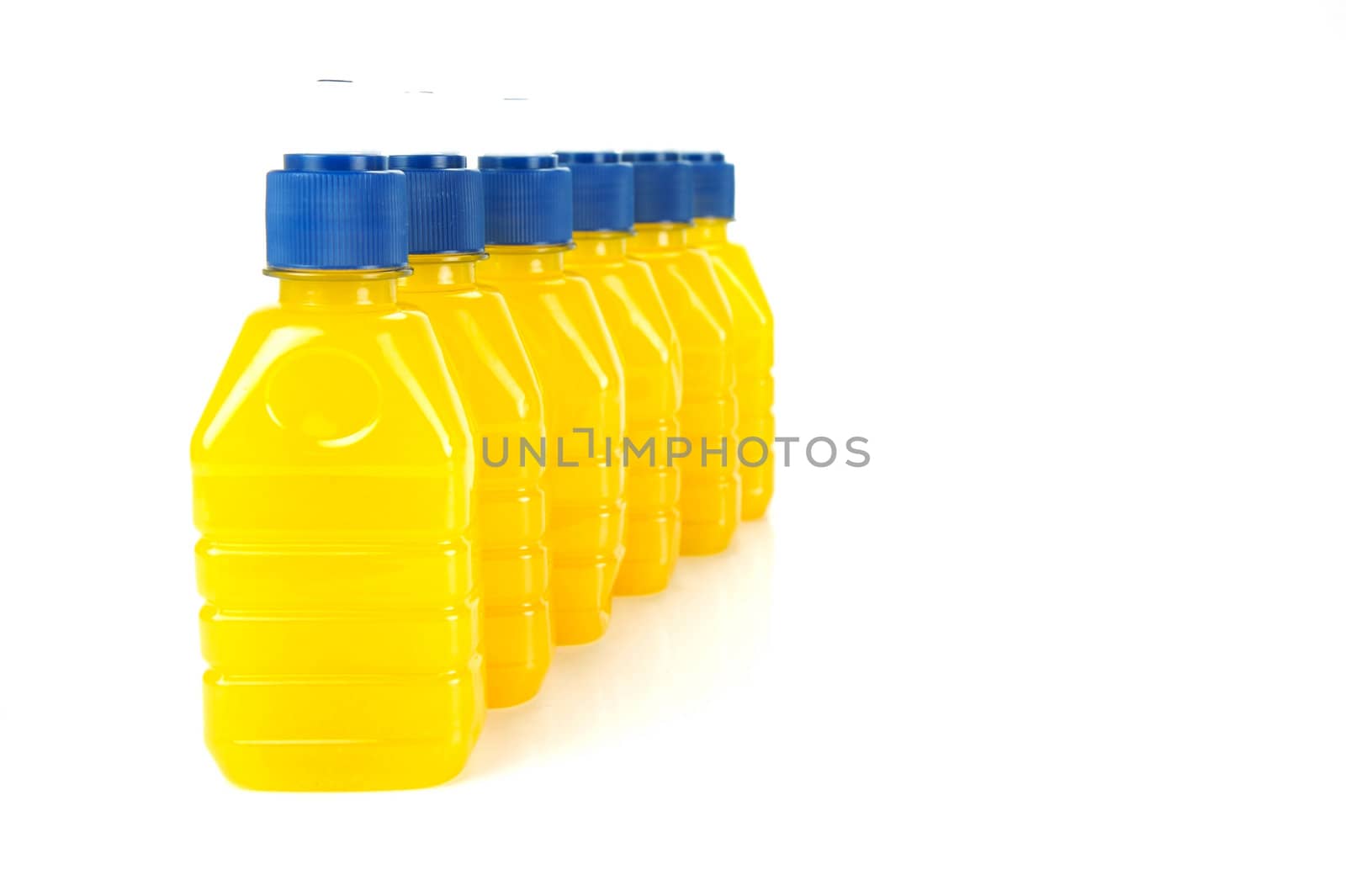 Pop top juice bottles isolated against a white background