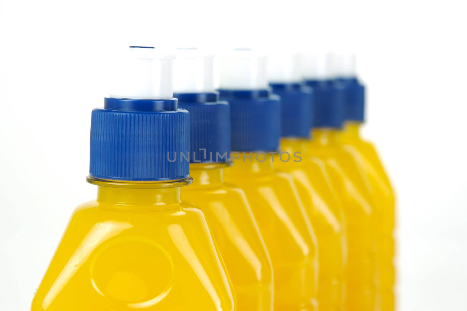 Pop top juice bottles isolated against a white background