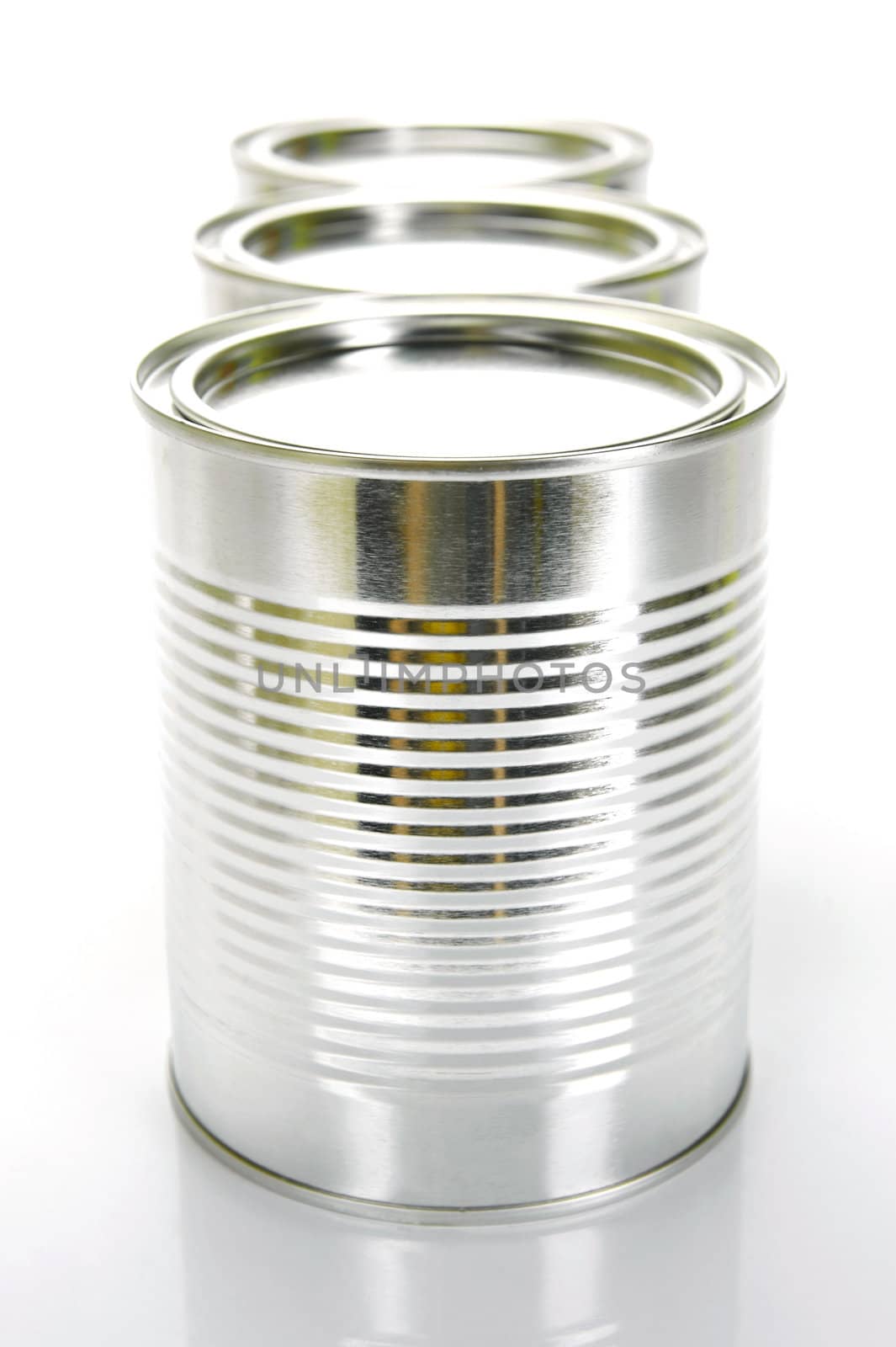 Tin cannisters isolated against a white background