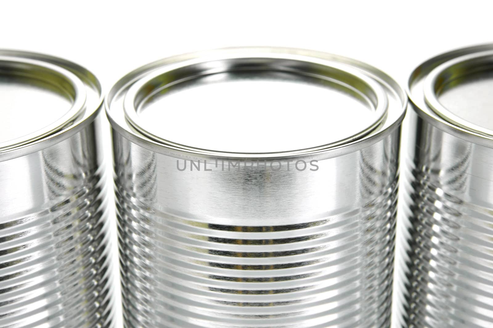 Tin cannisters isolated against a white background
