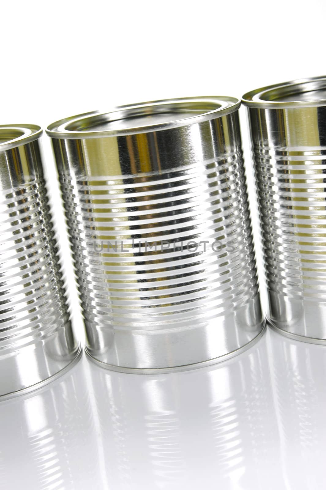 Tin cannisters isolated against a white background