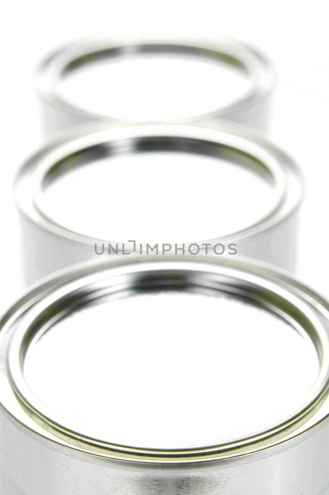 Tin cannisters isolated against a white background