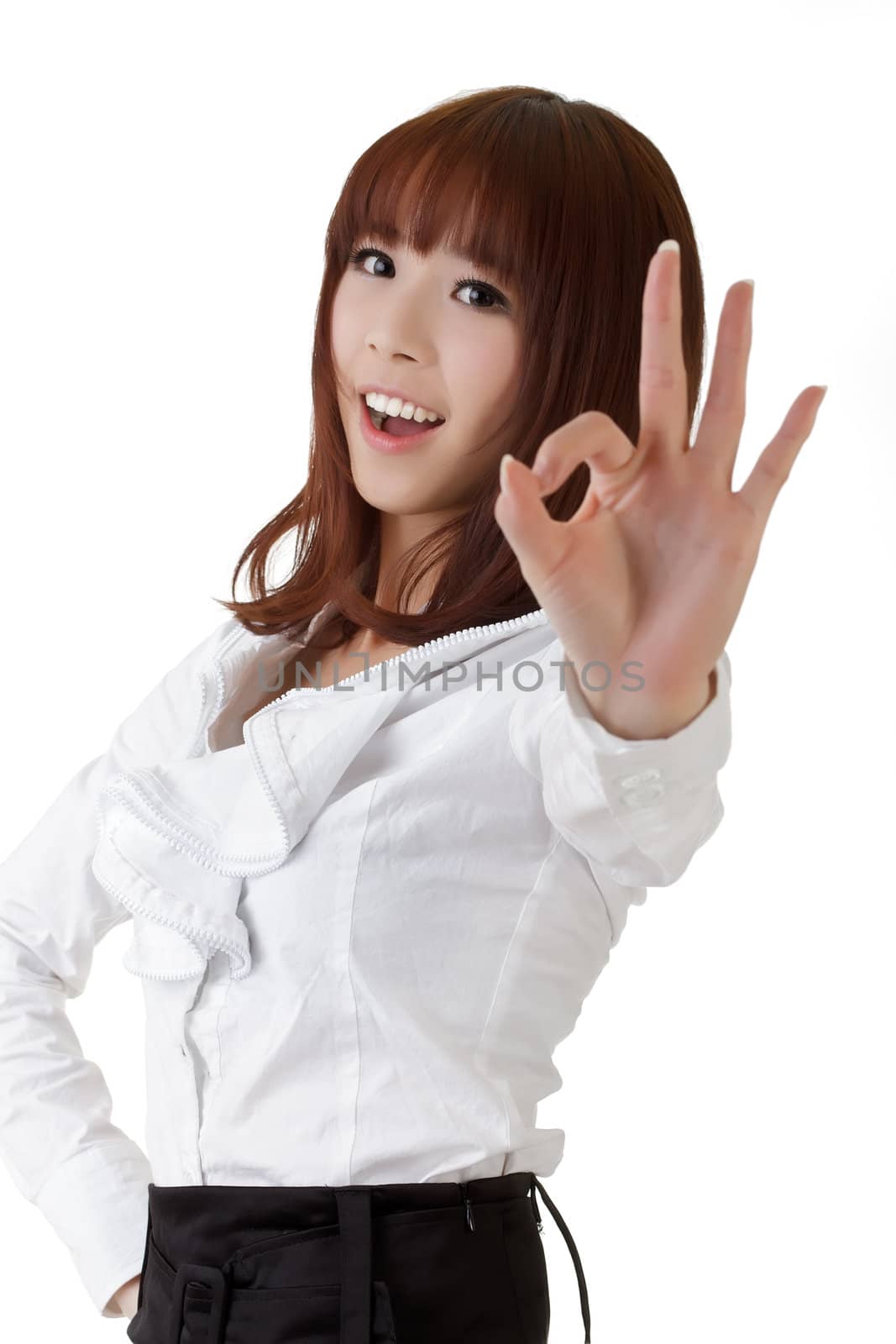 Pretty business woman give you Okay gesture with smile.