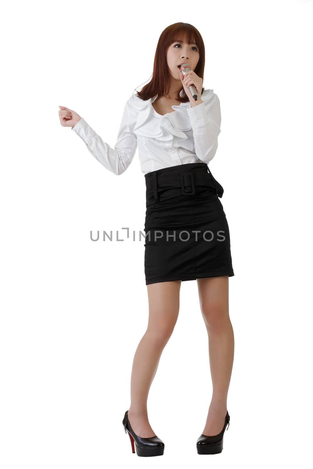 Business woman singing, full length portrait isolated on white.
