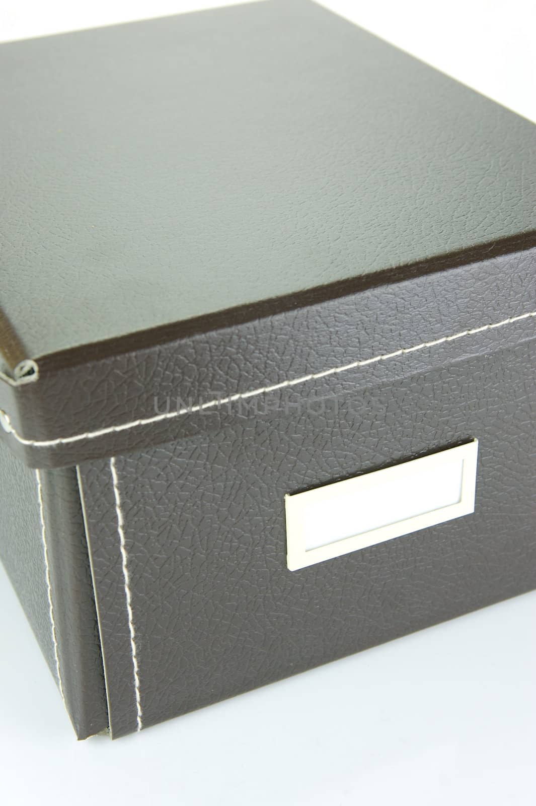 Brown stationery boxes isolated against a white background