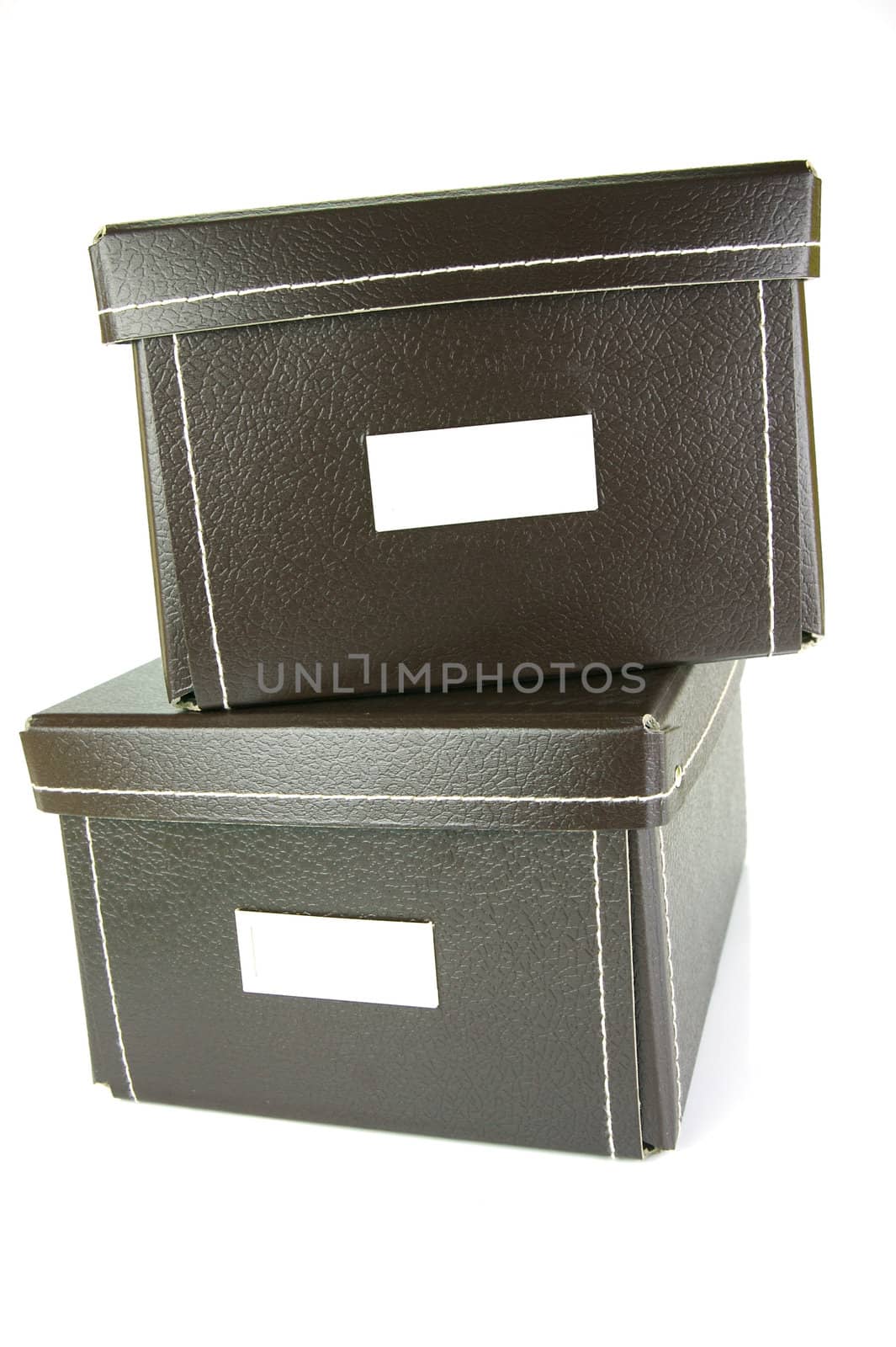 Brown stationery boxes isolated against a white background