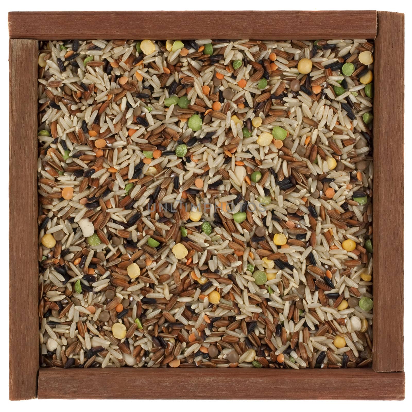 pilaf mix with brown and black, Japanica rice, black eye, split green, yellow pea, lentils in a rustic, wooden box isolated on white