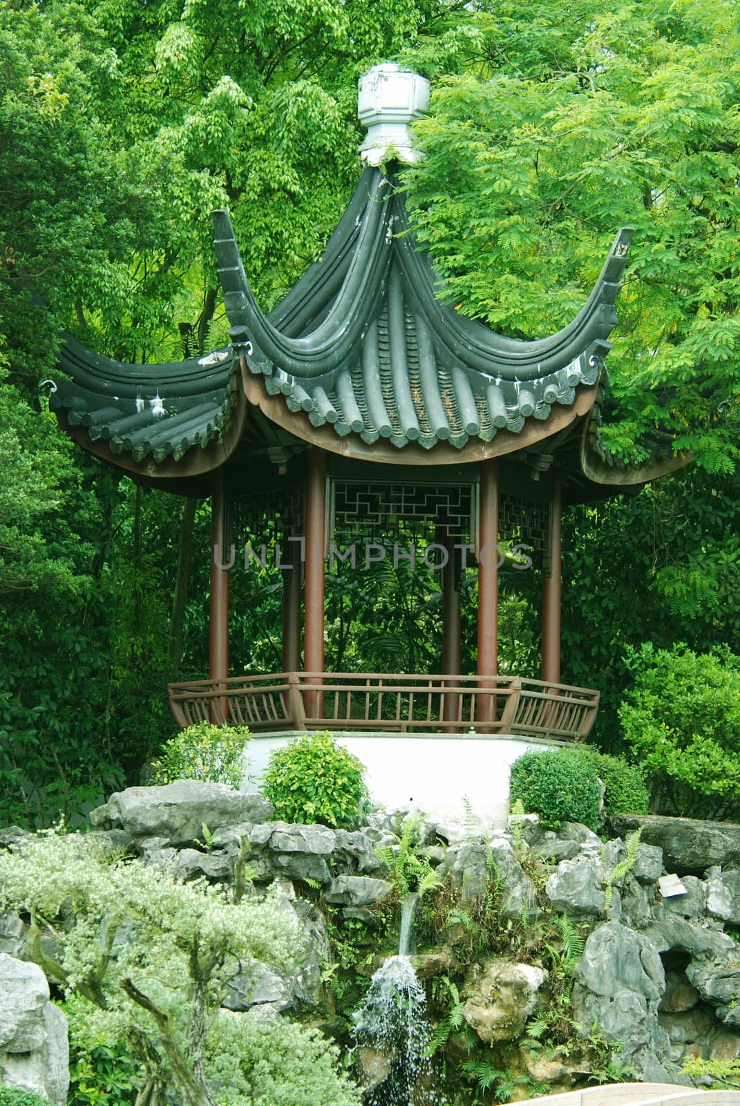 A view of ancient chinese architecture in a park.