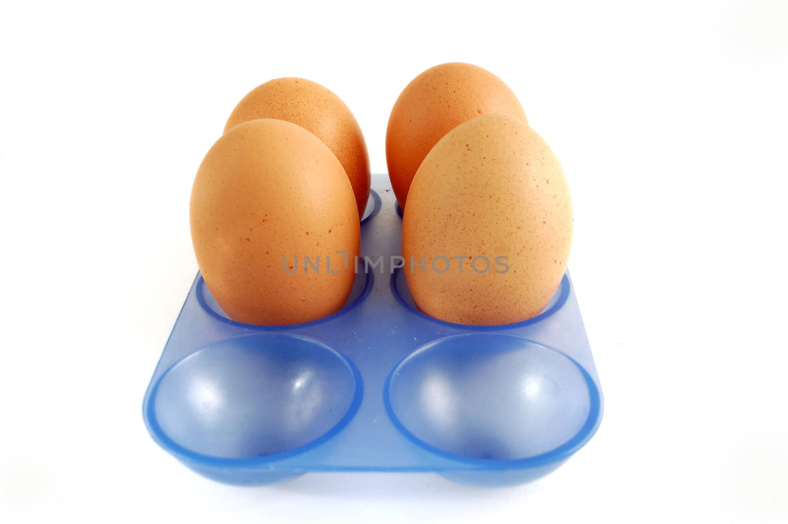 Egg carton with eggs on white background