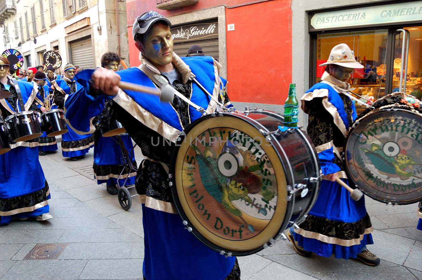 DOMODOSSOLA, ITALY - FEBRUARY 21: Traditional Swiss band "Joopimuisig Chruit Frassar" performs outdoor at Carnival. February  21, 2009 in Domodossola, Italy.