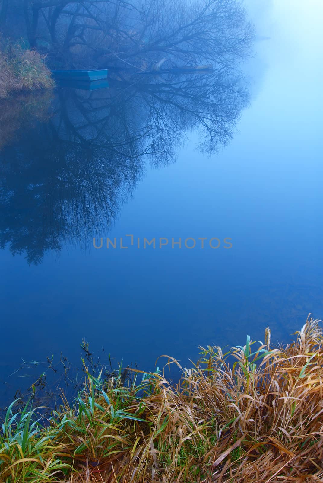 The silent river in the early autumn morning.