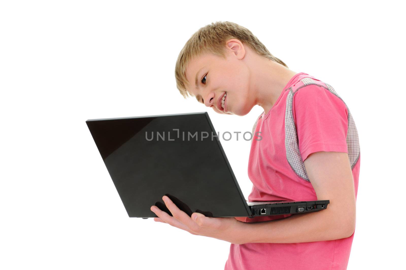The surprised teenager with laptop isolated on white background