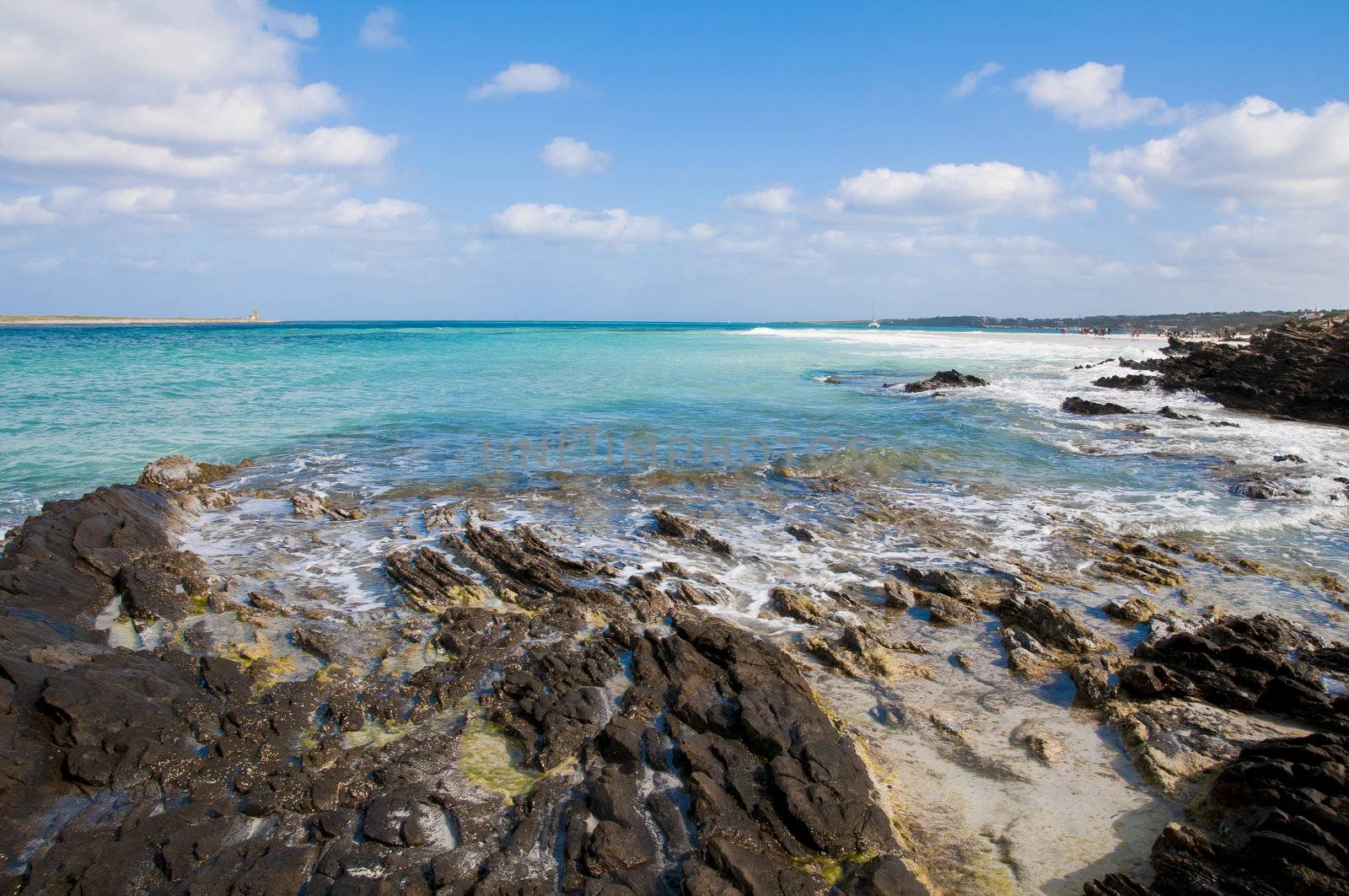 rocks on the beach of Stintino in Sardinia by peus