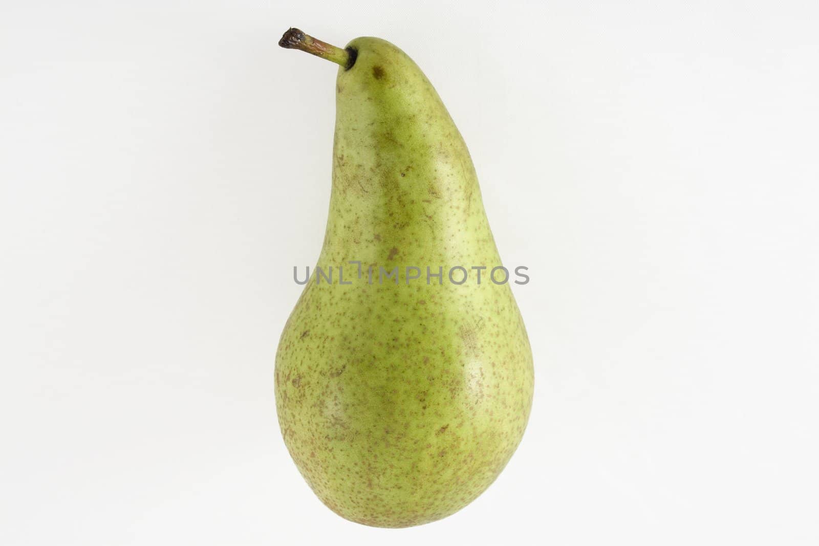 Close up of not so perfect pear on white background