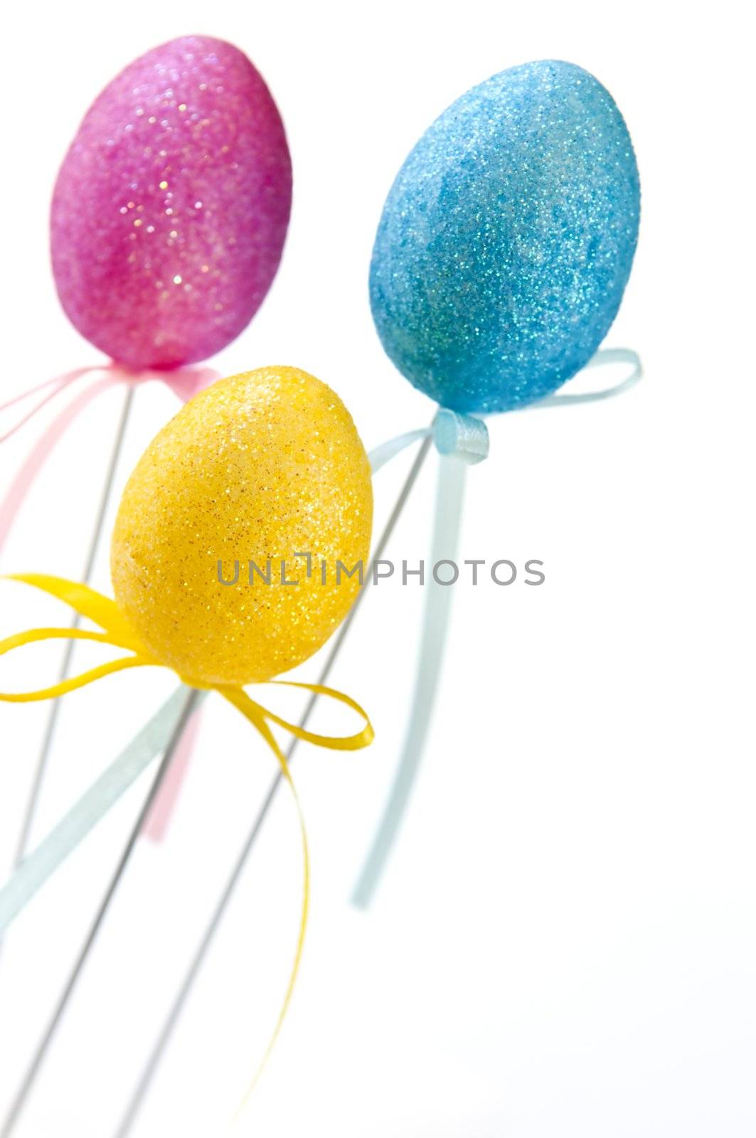 Cute Easter toy eggs isolated on white background