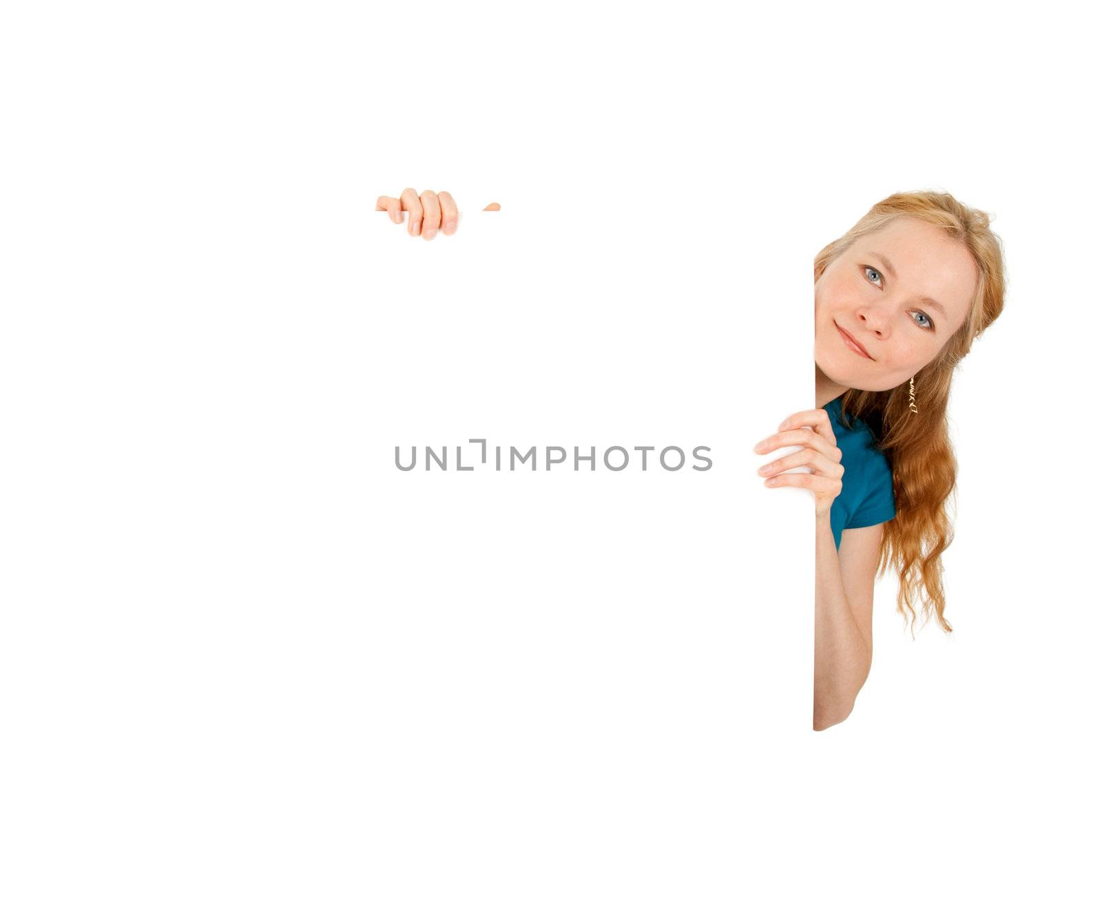 Cute young women holding a blank banner ad, isolated on white.