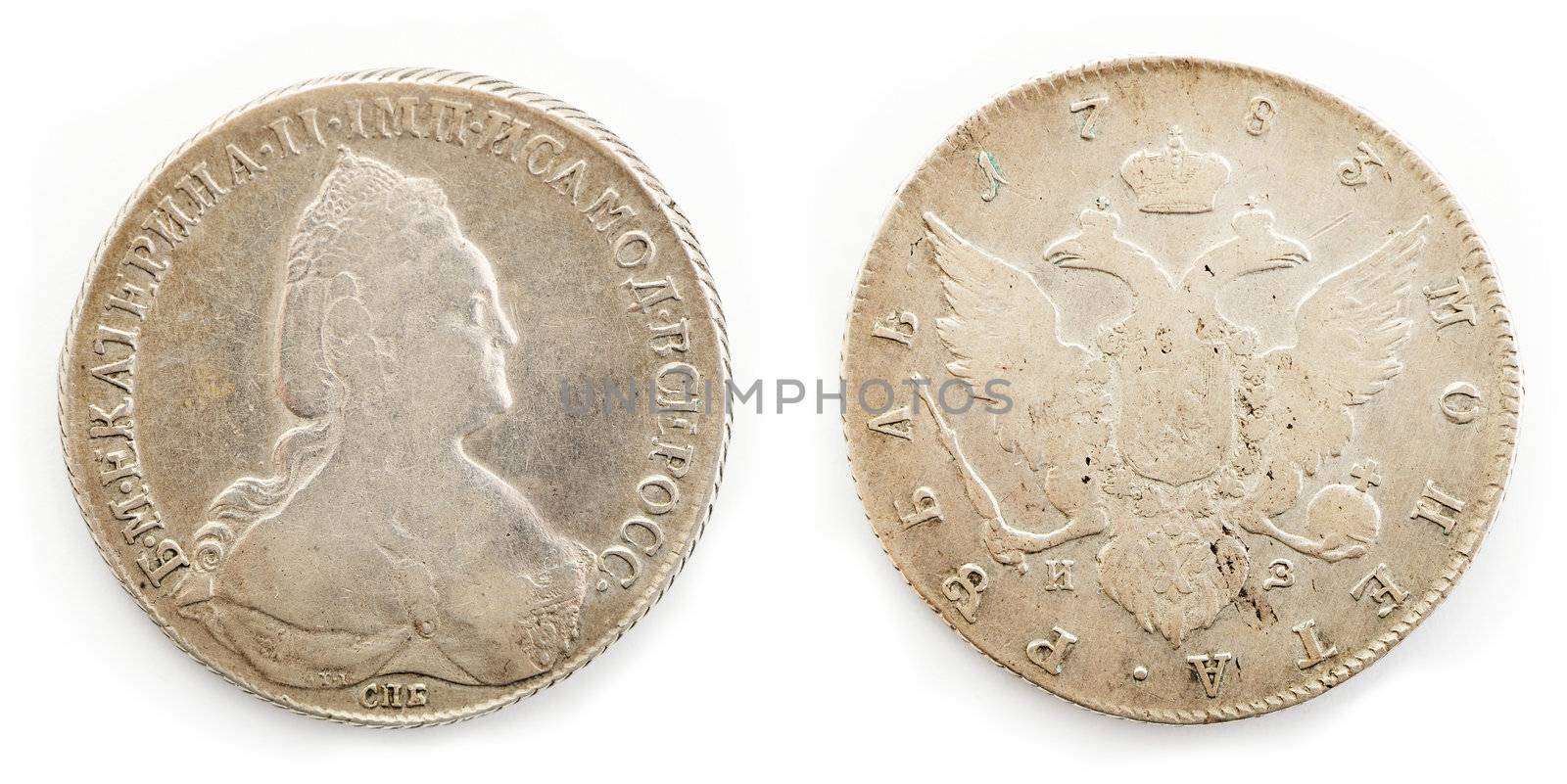 Old coin isolated on the white background