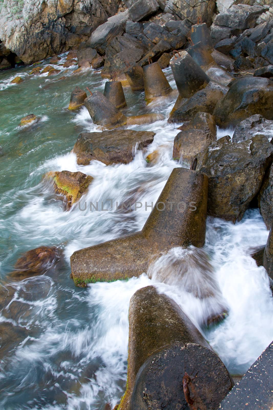 waves crashing against rocks