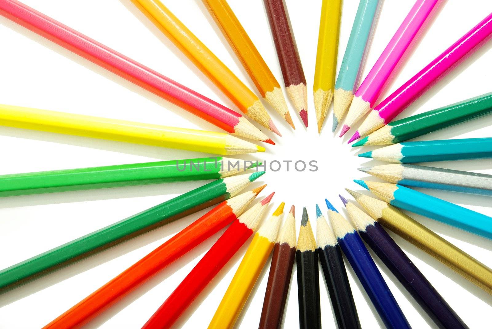  Assortment of coloured pencils  on white background