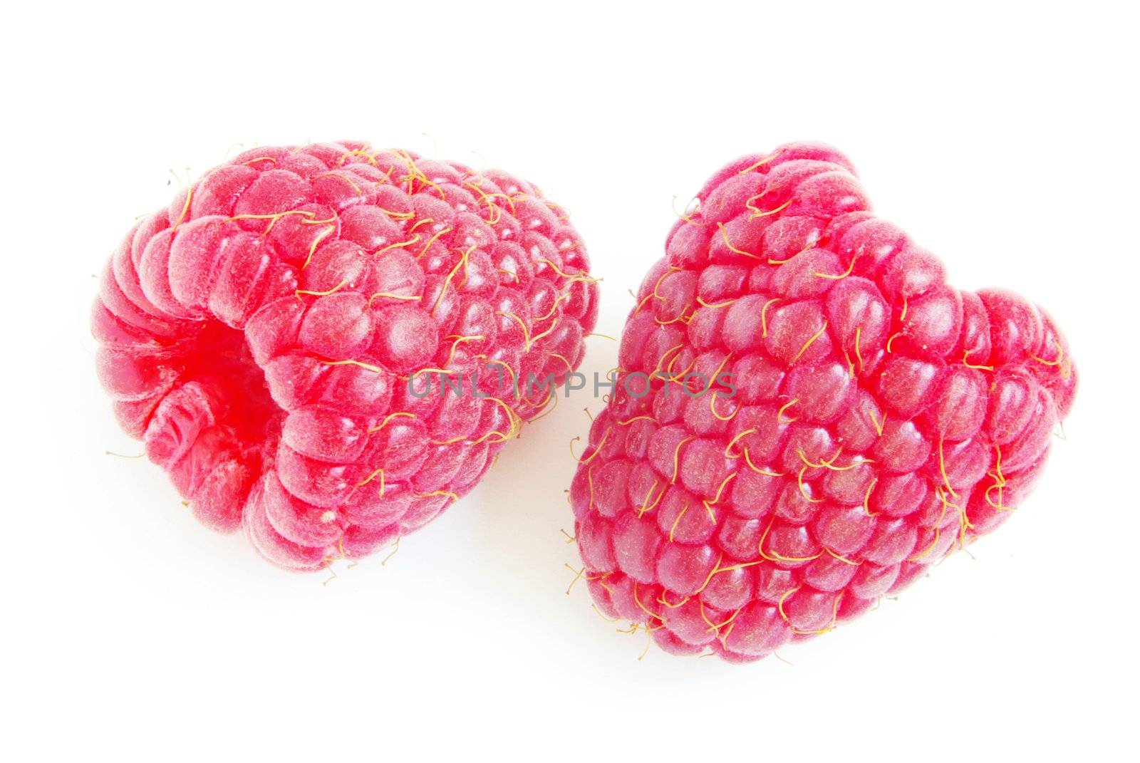 Ripe raspberry isolated on a white background