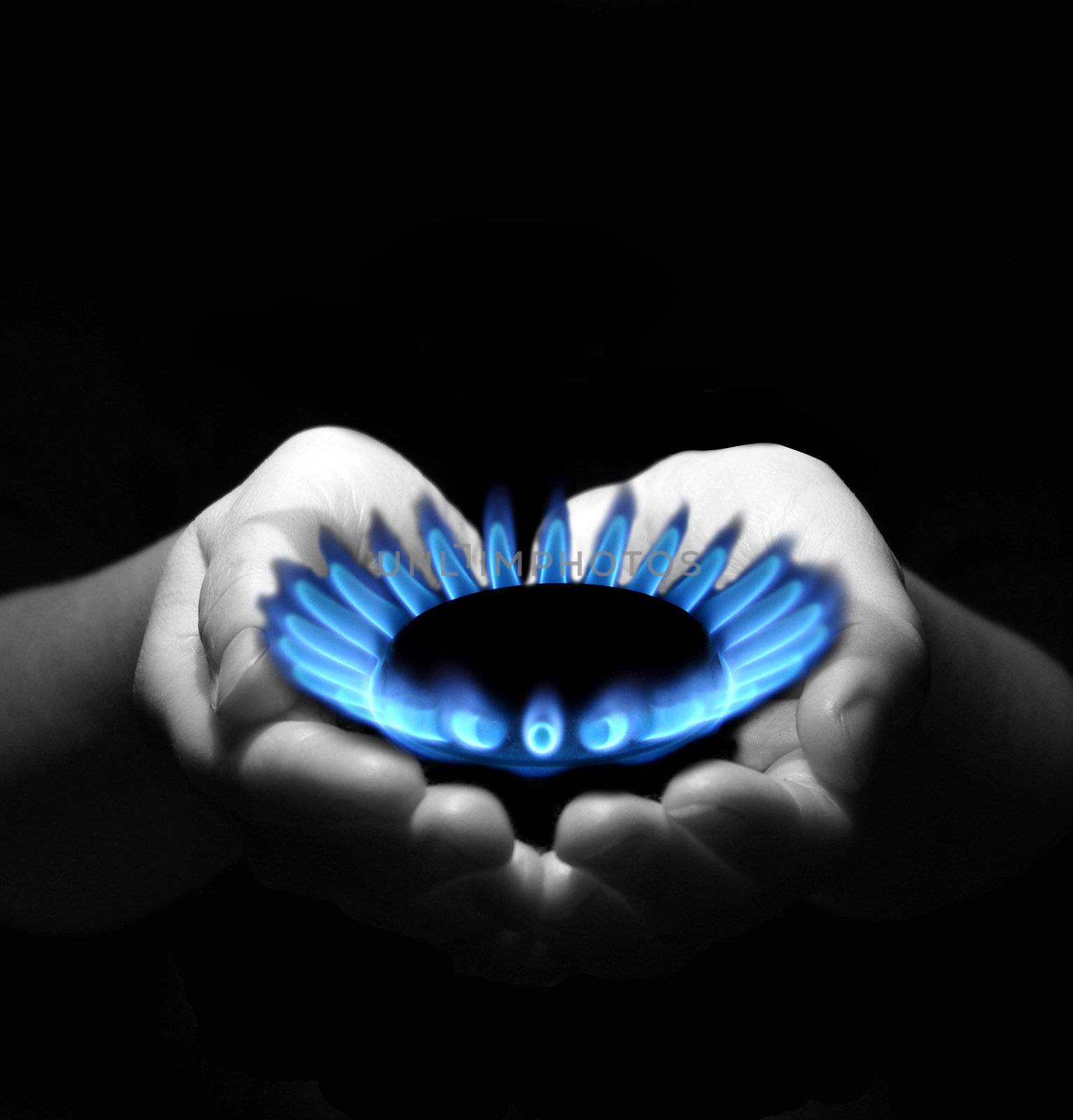 Hands holding a flame gas