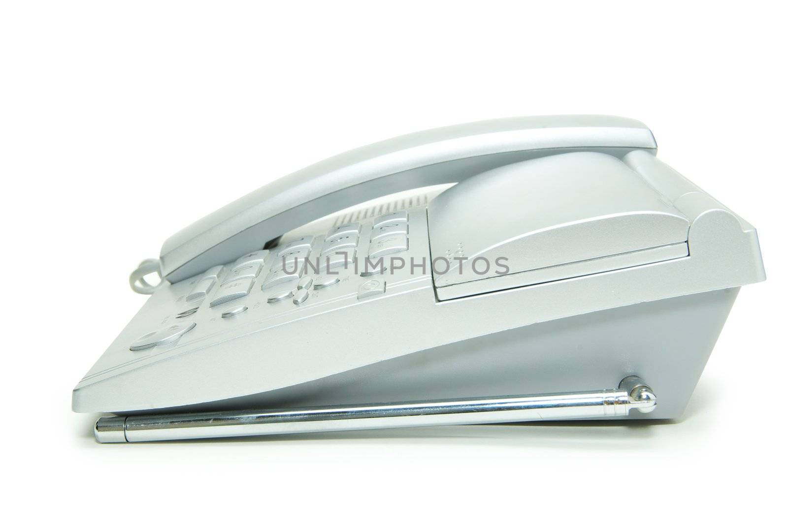 grey office telephone on a white  background