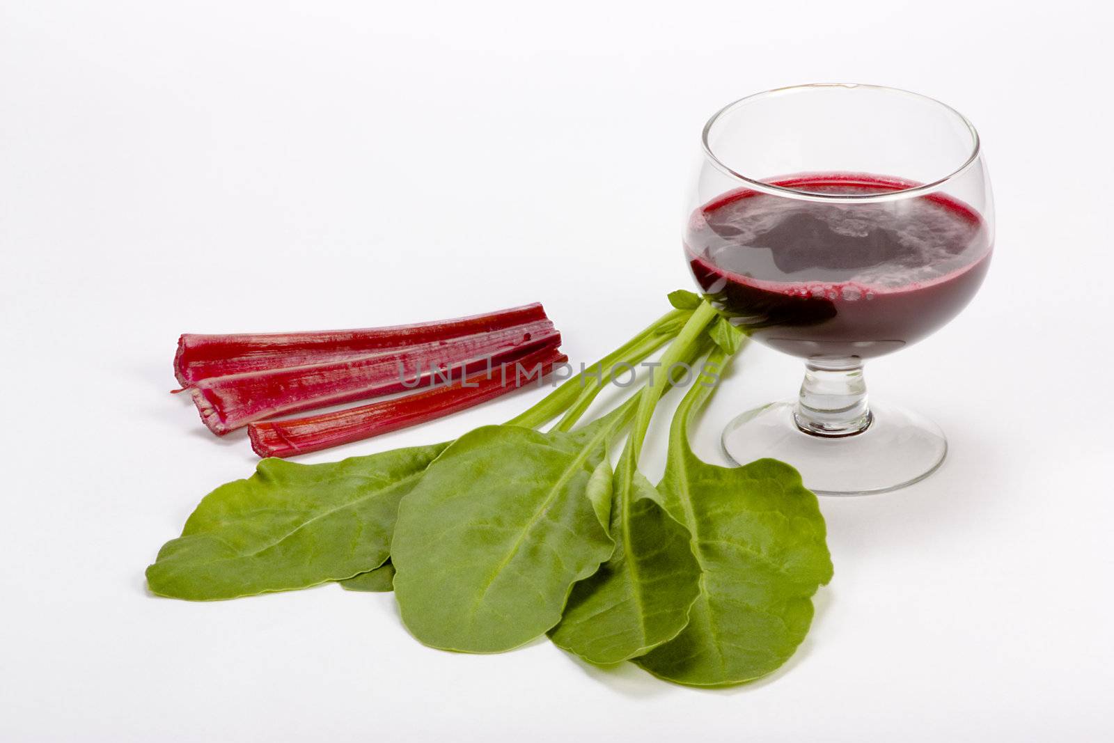 Fresh spinach  and beetroot juice isolated white background