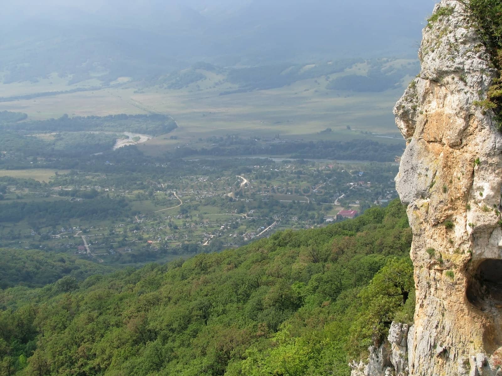 Mountains; rocks; a relief; a landscape; a hill; a panorama; Caucasus; top; a slope; a snow; a cool