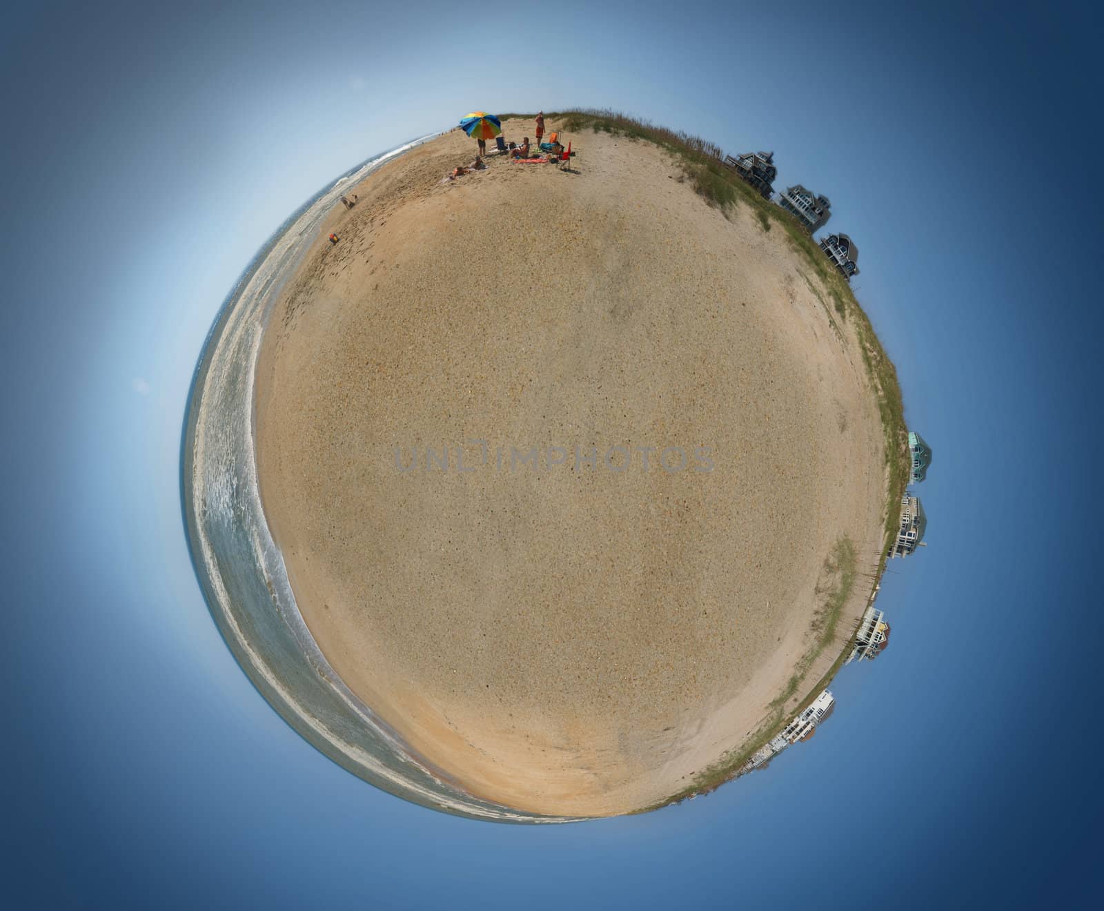 Small planet with nothing but water, sand, dunes, and beach houses.