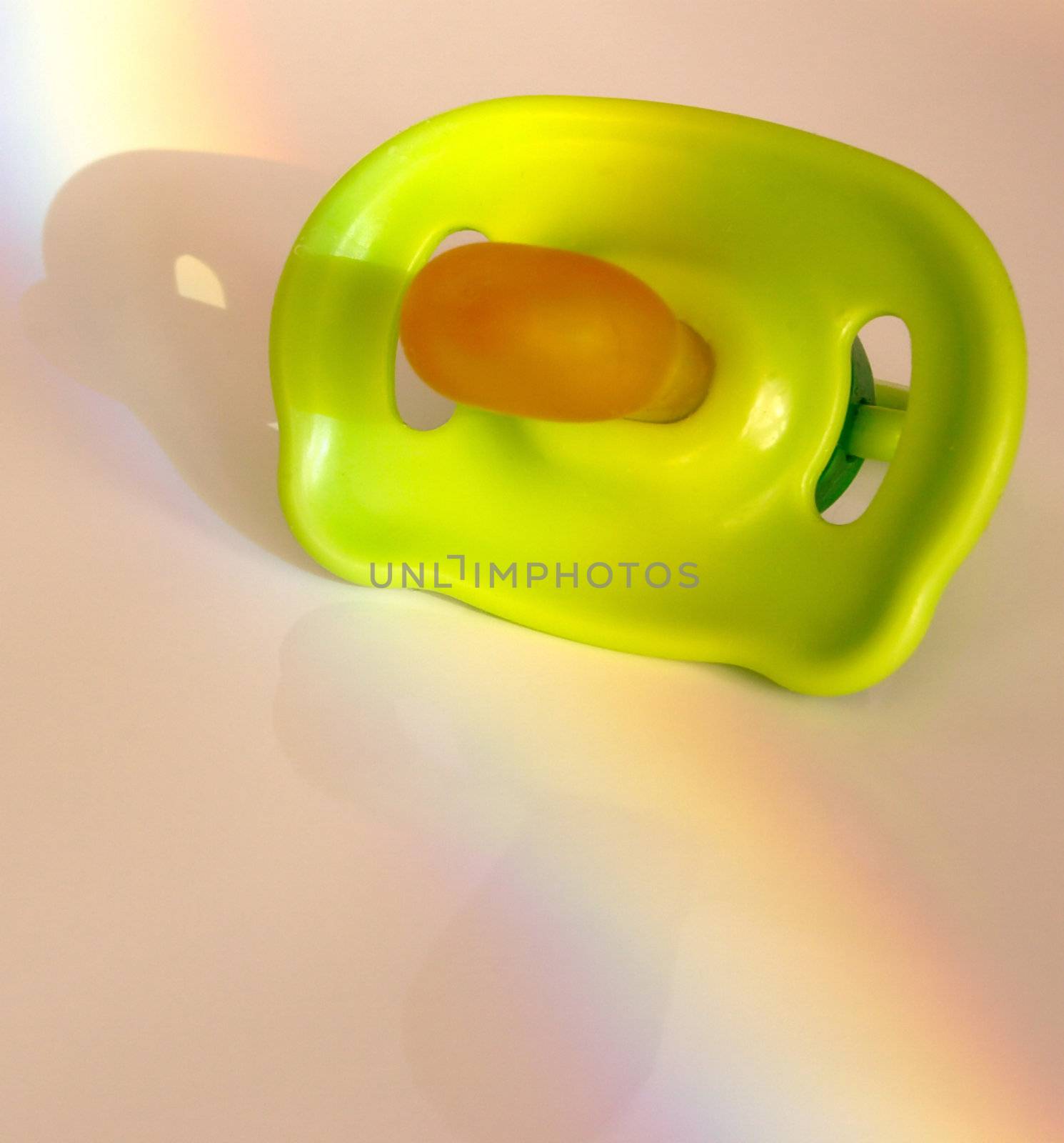 childs dummy with a rainbow across it
