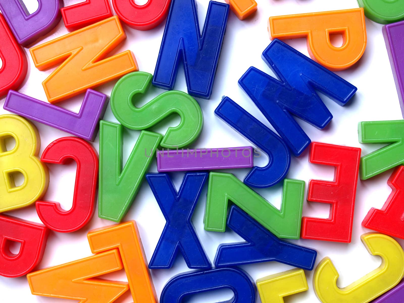 English alphabet letters in plastic toy characters