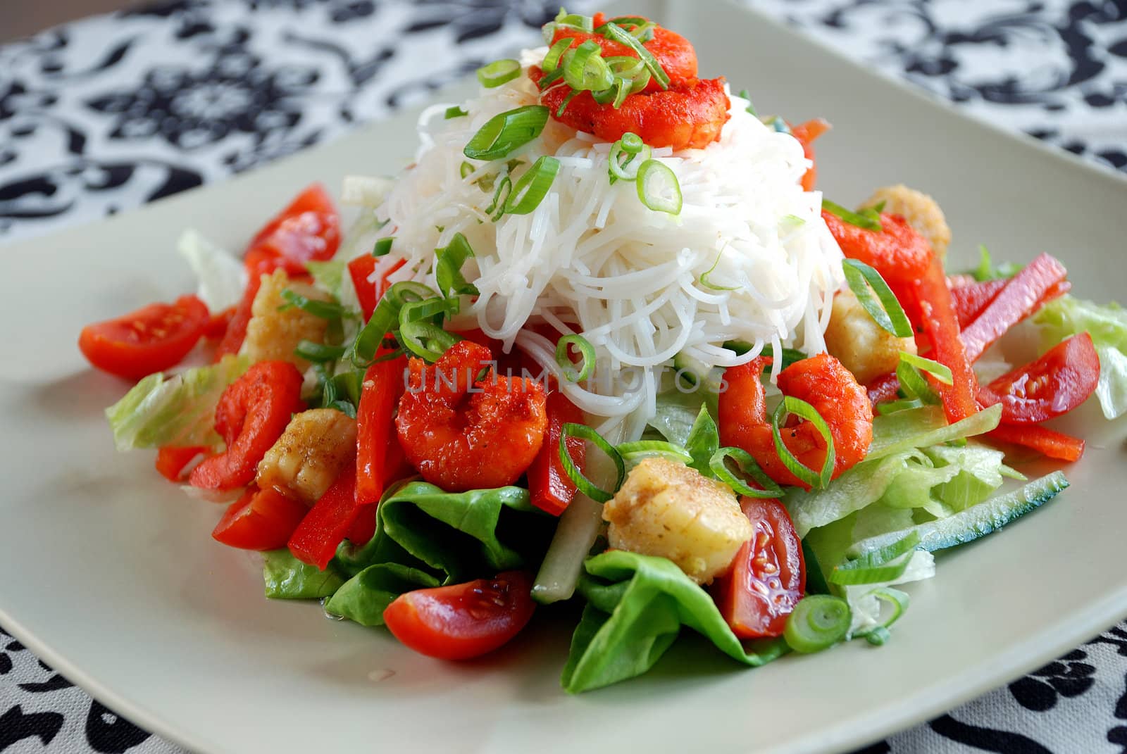 Delicious spicy prawn salad with rice noodles