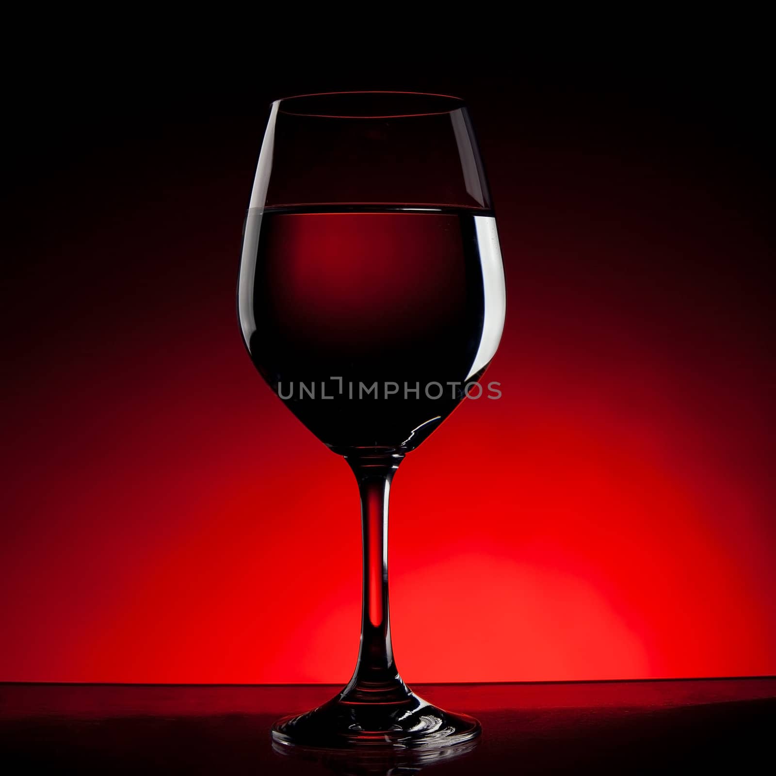 Wine glass outlines with red background.