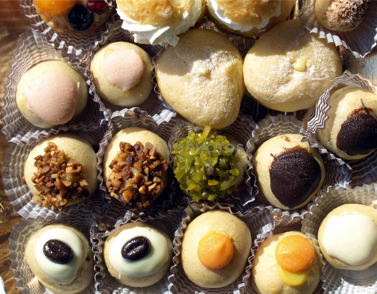 Mixed pastries with chocolate, cream, fruit