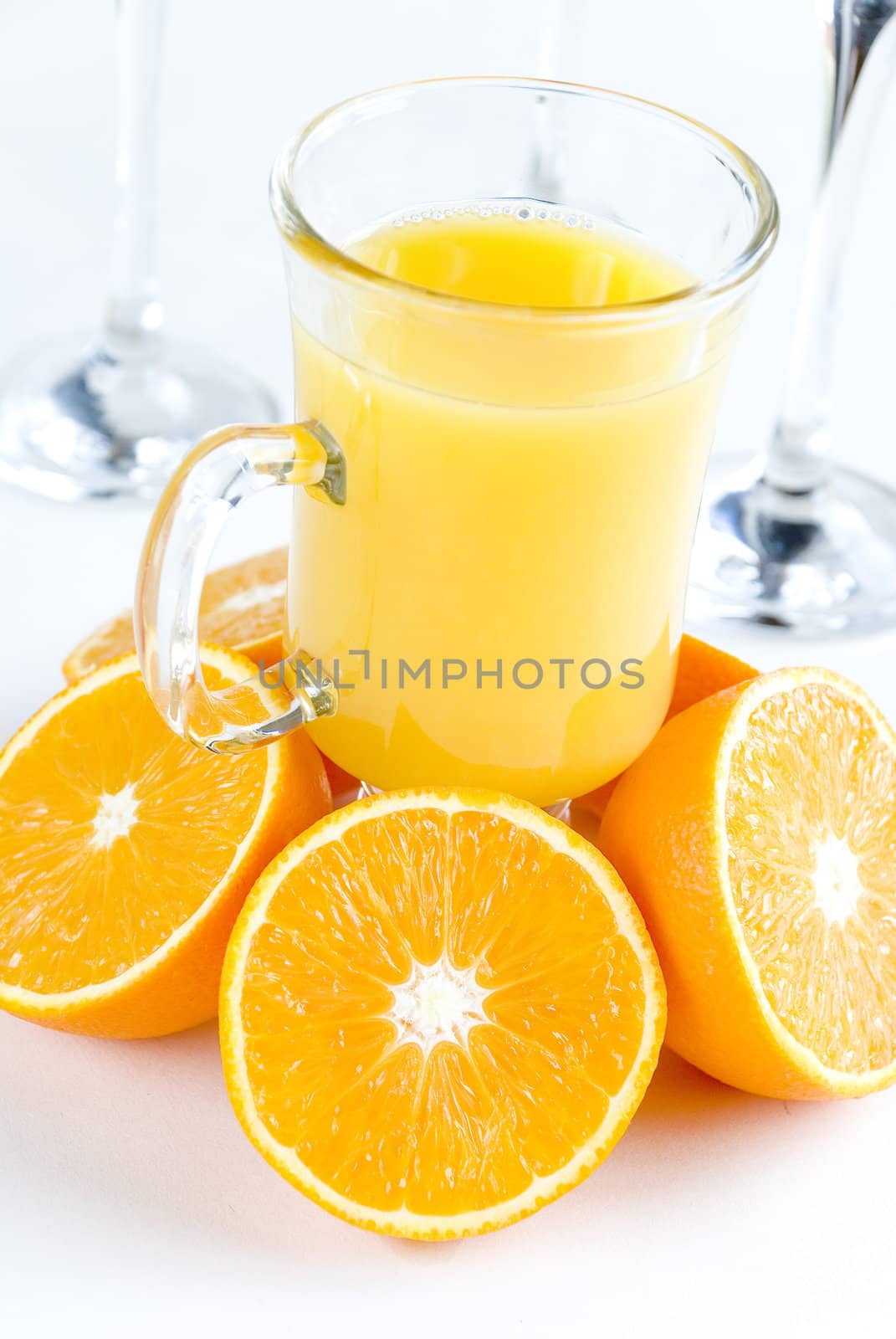 Fresh oranges and orange juice