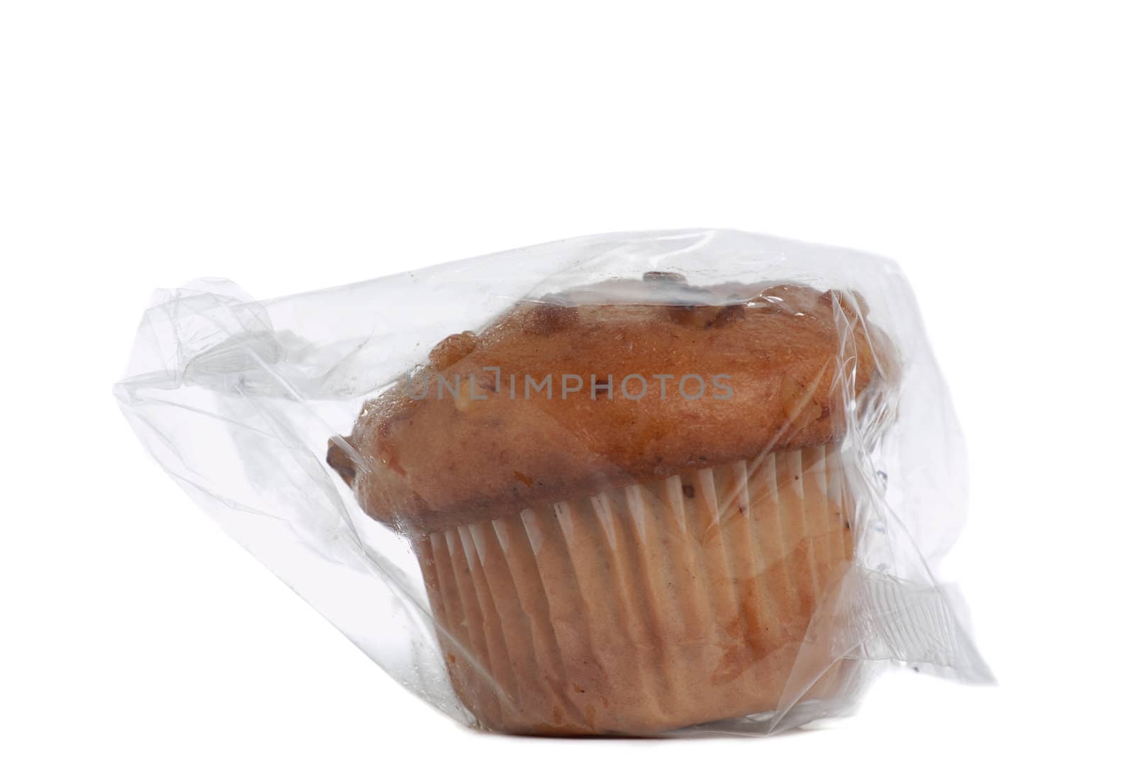 wrapped muffin isolated on white background