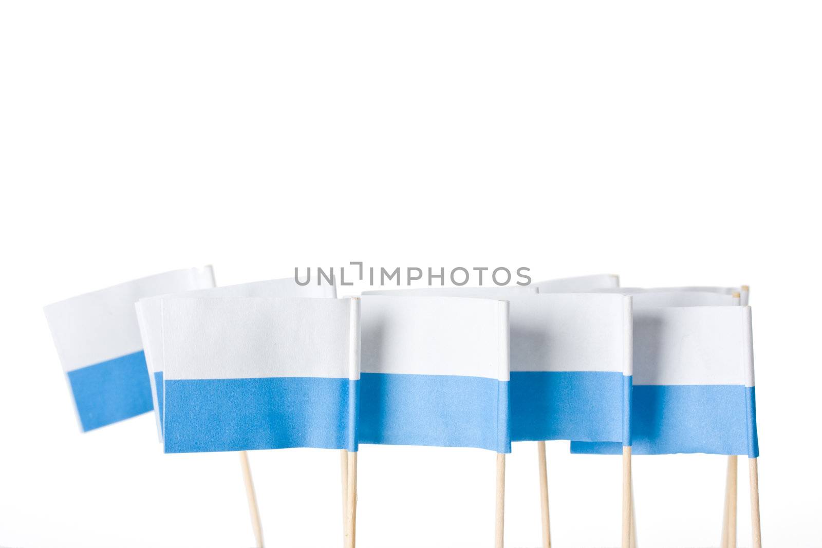 white and blue flags on tooth picks