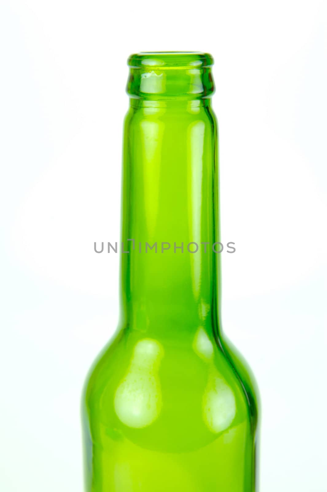 Empty beer bottles isolated against a white background