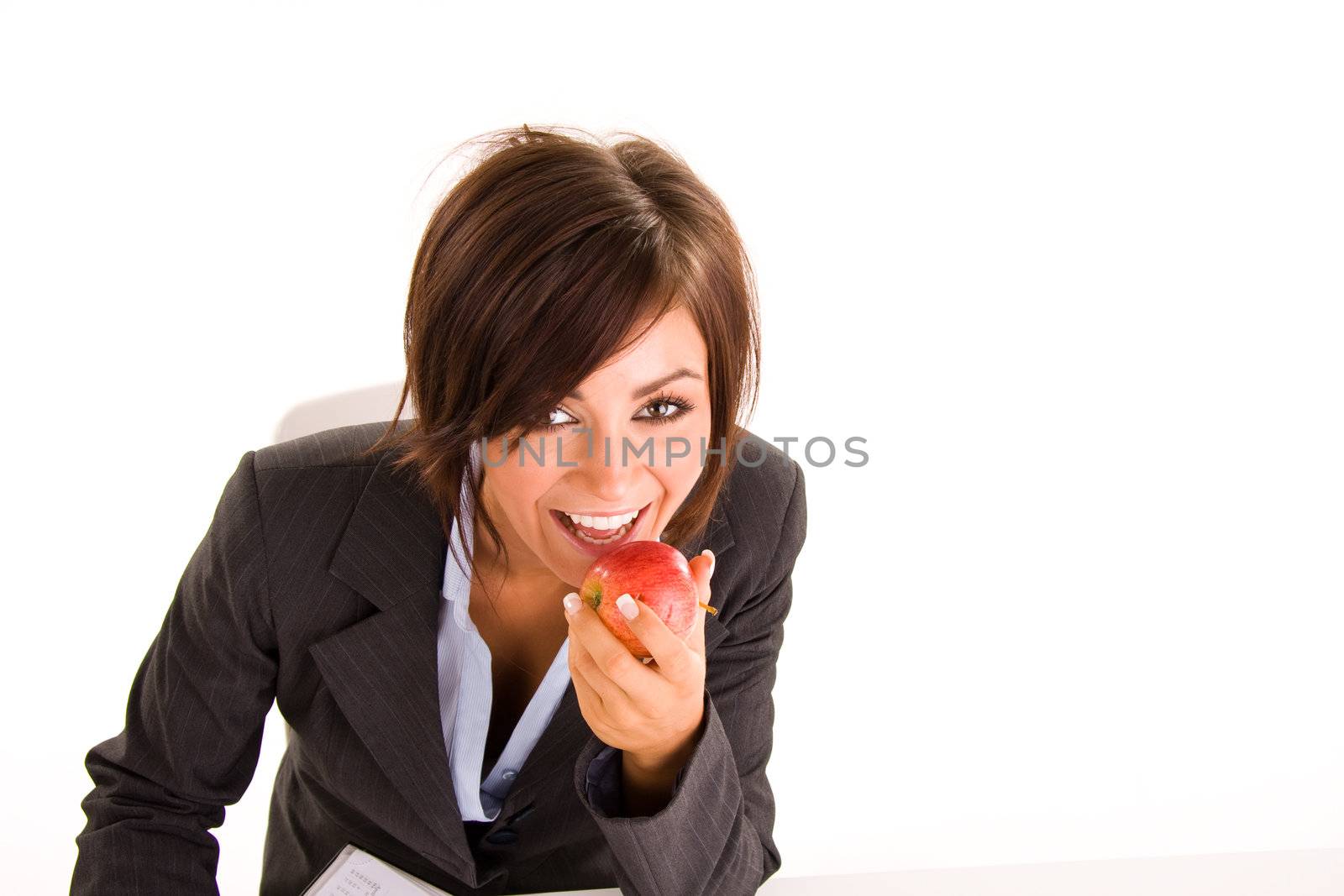 Young business woman writing in a diary