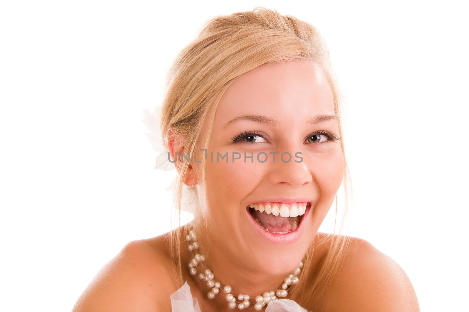Beautiful young blond bride laughing