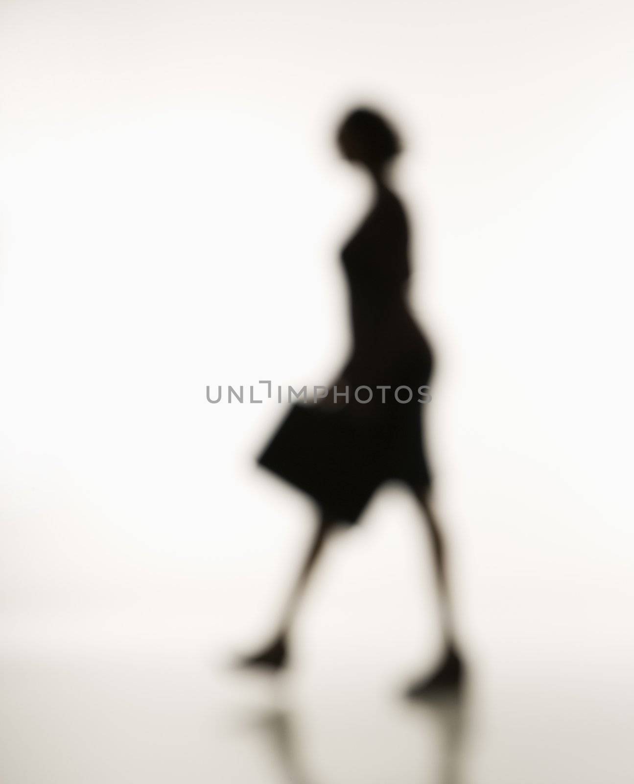 Businesswoman walking. by iofoto