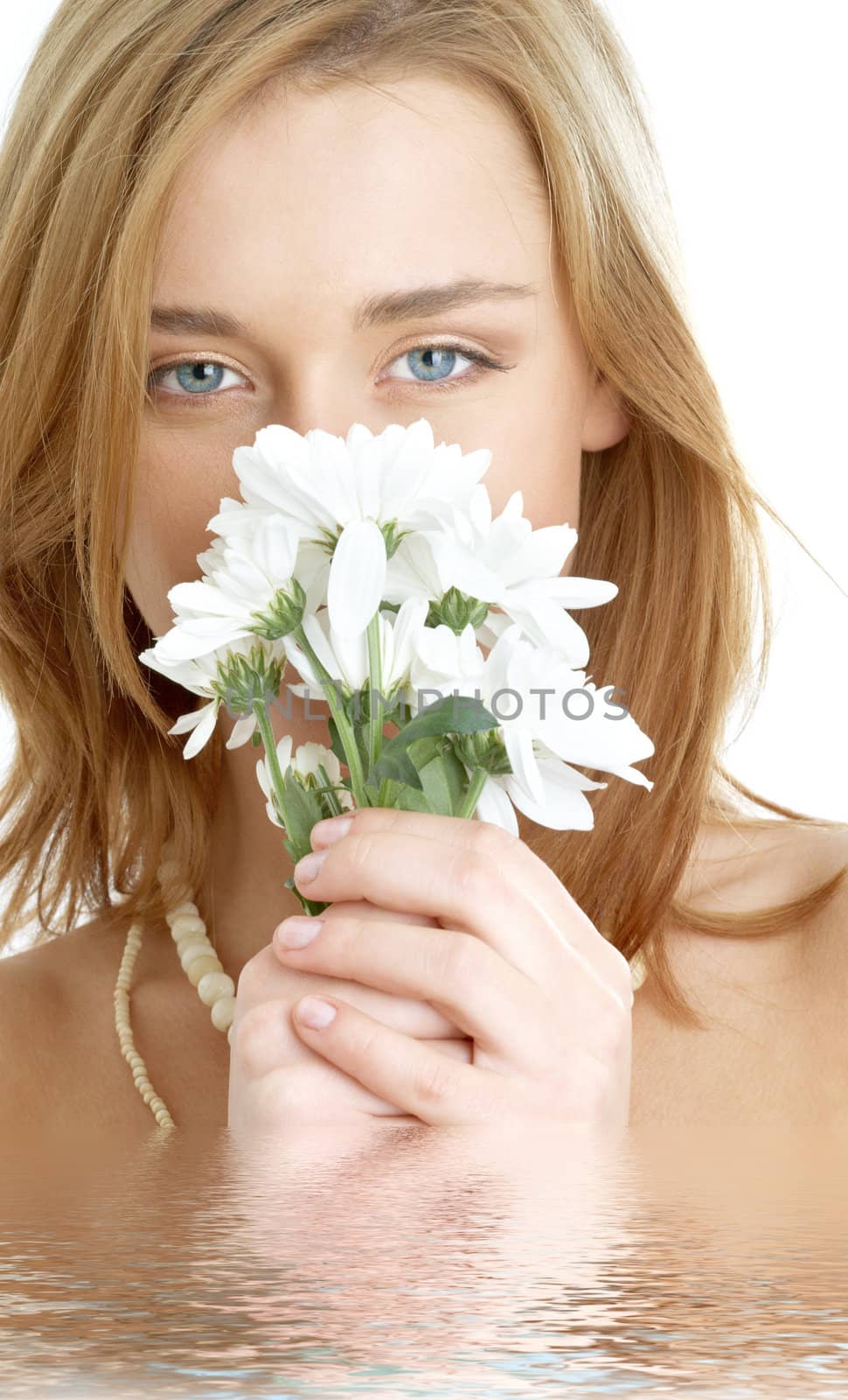 girl with white chrysanthemum flowers in water