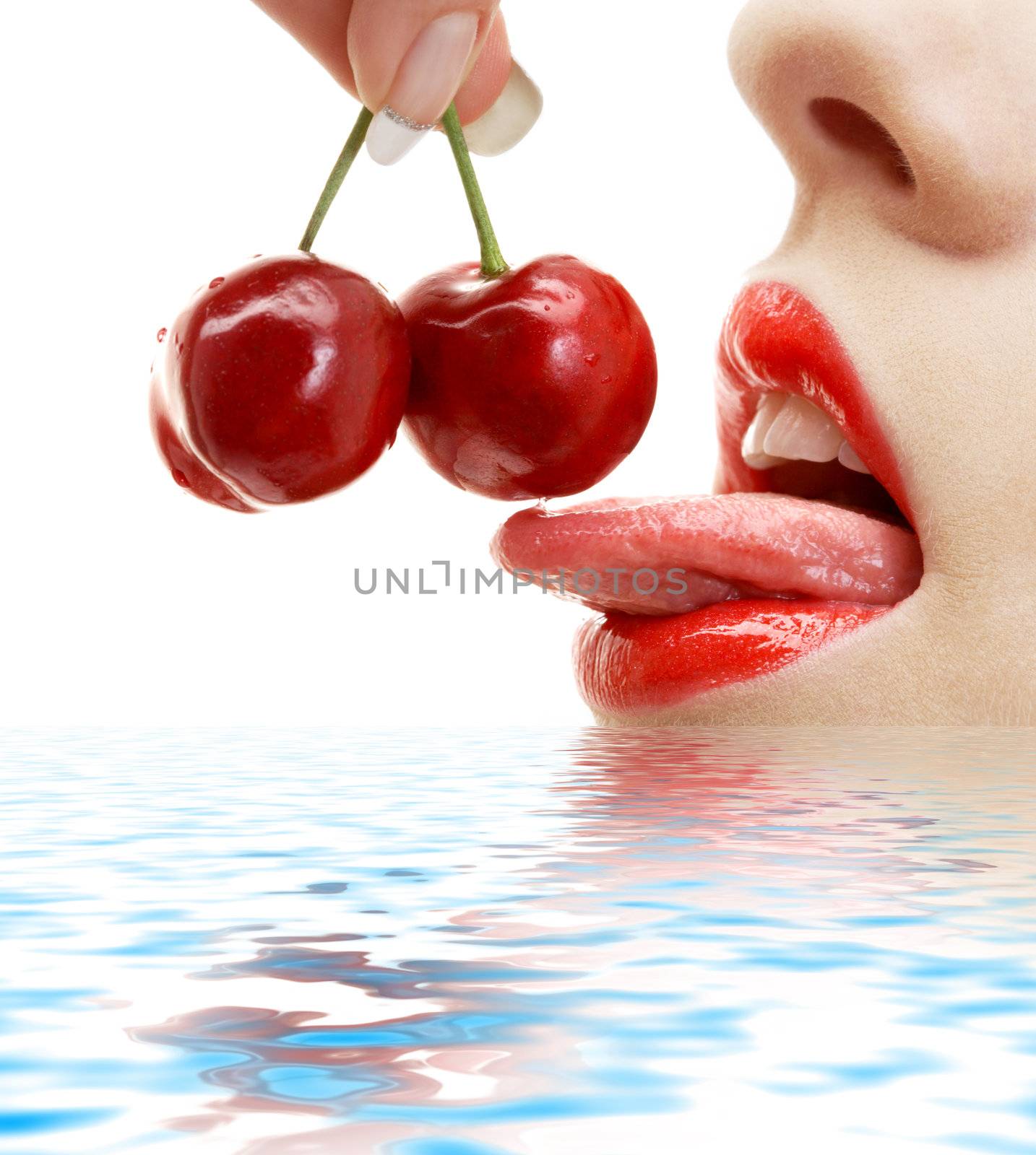 picture of cherry, lips and tongue in water